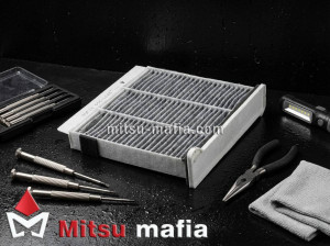 Салонный фильтр Митсубиси Паджеро Спорт 2 угольный Sufix SSC-1040